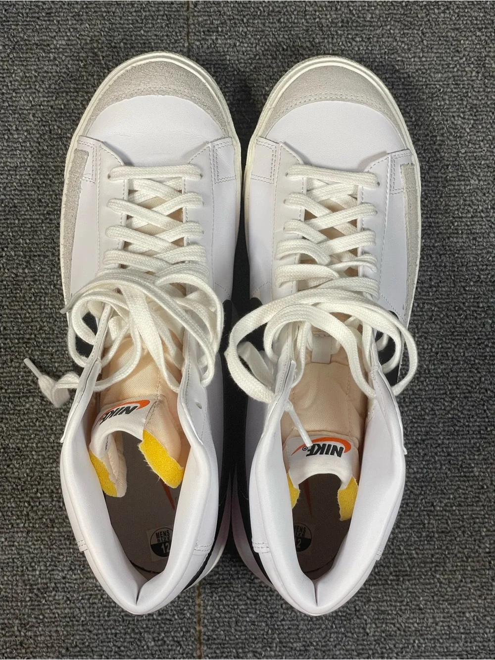 Men’s Nike White High-Top Sneakers with Black Swoosh